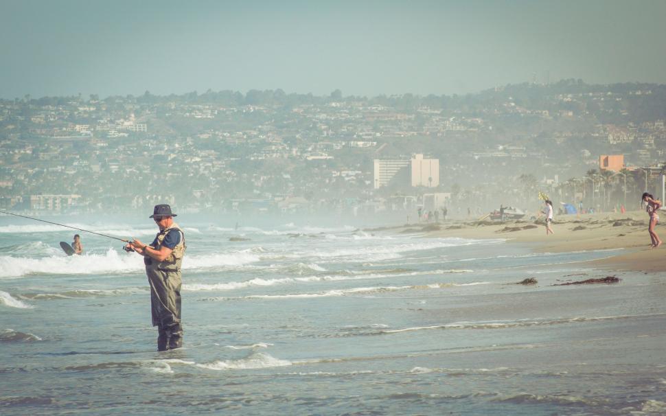 Free Image of Man Fishing in Ocean 
