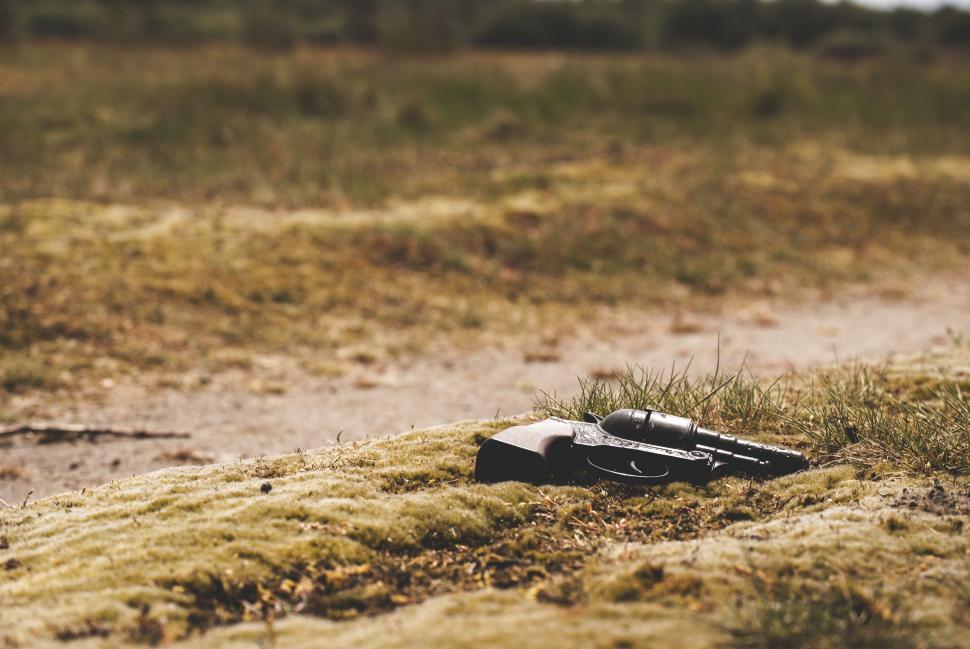 Free Image of Gun Abandoned in Field 