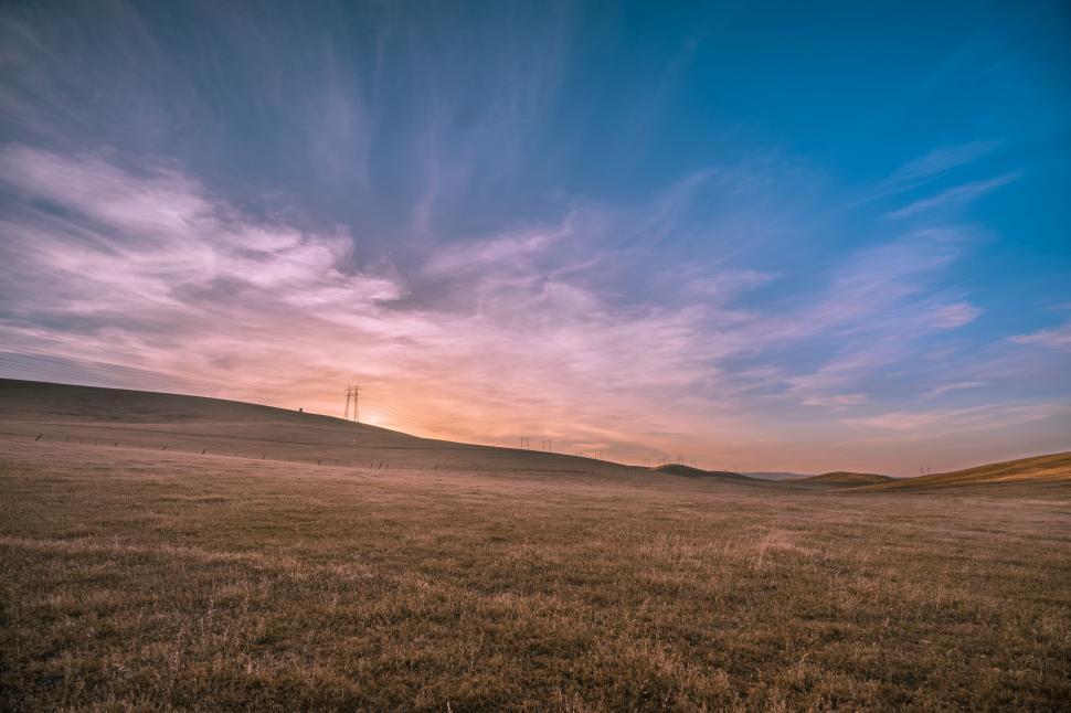 Free Image of Windmill in a Large Open Field 