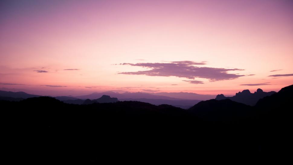 Free Image of Purple Sky With Clouds and Mountains 