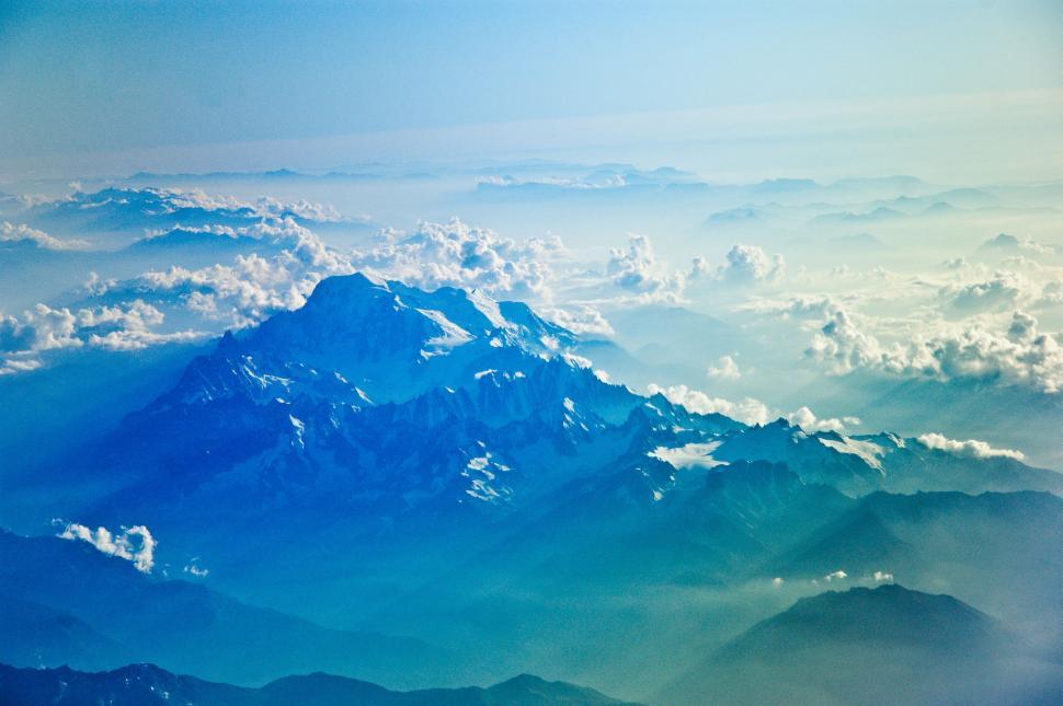 Free Image of A View of a Mountain From an Airplane Window 