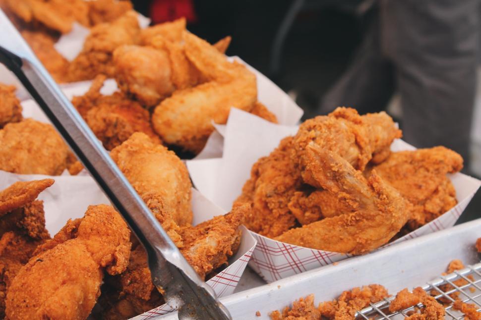 Free Image of Table With Trays of Fried Food 
