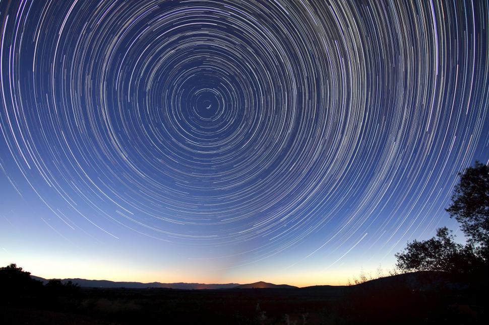 Free Image of Star Trail Illuminating the Night Sky 