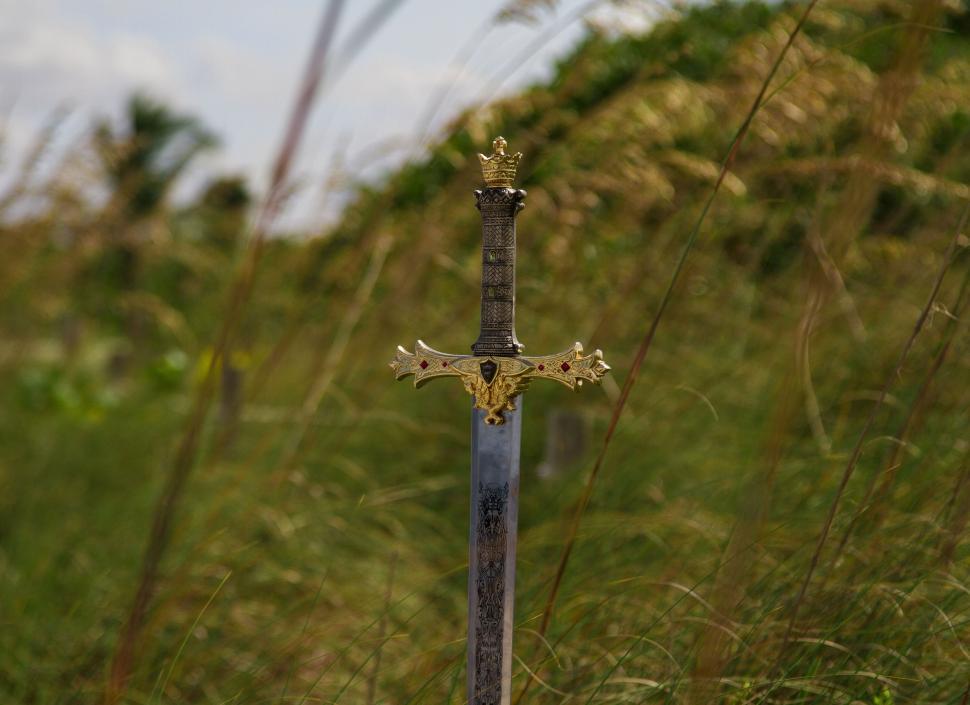 Free Image of Sword in a Field of Tall Grass 
