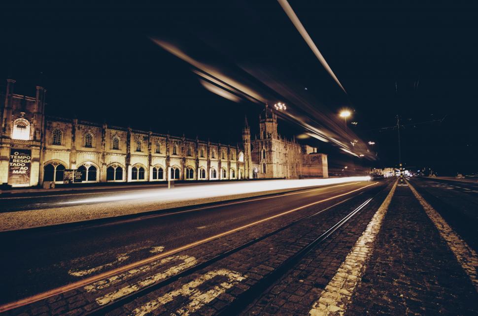 Free Image of Busy Train Station Illuminated by Night Lights 