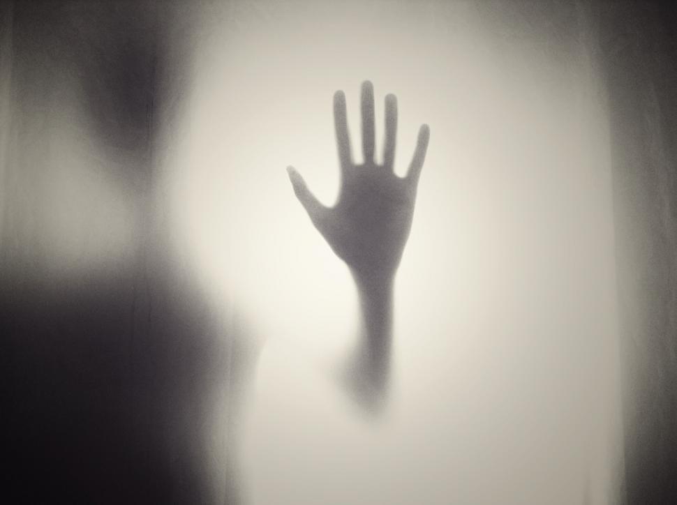 Free Image of Hand Reaching Out of Window 