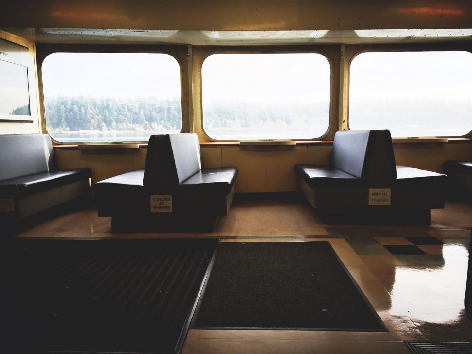 Free Image of Train Car Filled With Seats 