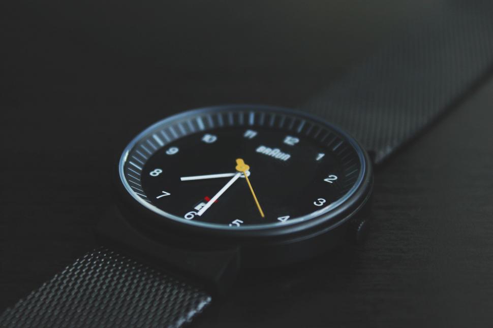 Free Image of Close Up of Watch on Black Surface 
