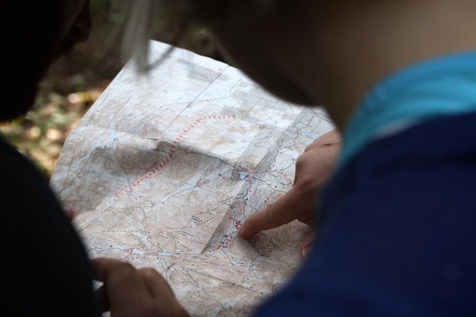 Free Image of Person Holding Piece of Paper With Map 