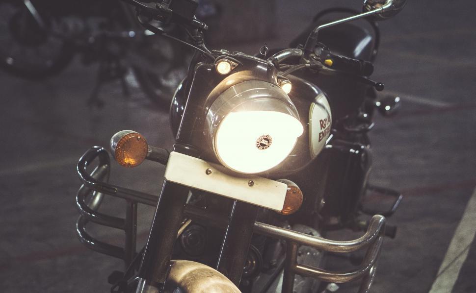 Free Image of Close Up of Motorcycle Parked on Street 