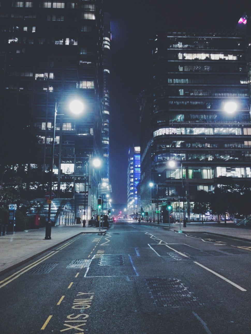 Free Image of Busy City Street Illuminated by Night Lights 