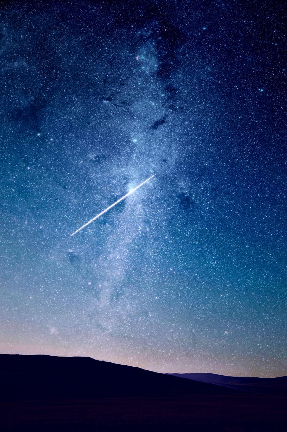 Free Image of Airplane Flying Through the Night Sky 