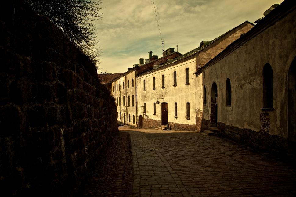 Free Image of Old Buildings Flanking a Narrow Alleyway 
