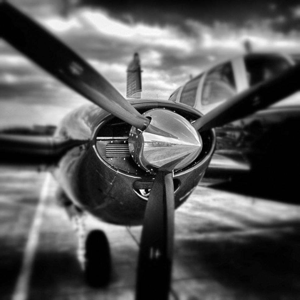 Free Image of Propeller Plane in Black and White 