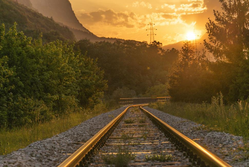 Free Image of Train Track With Sunset in Background 