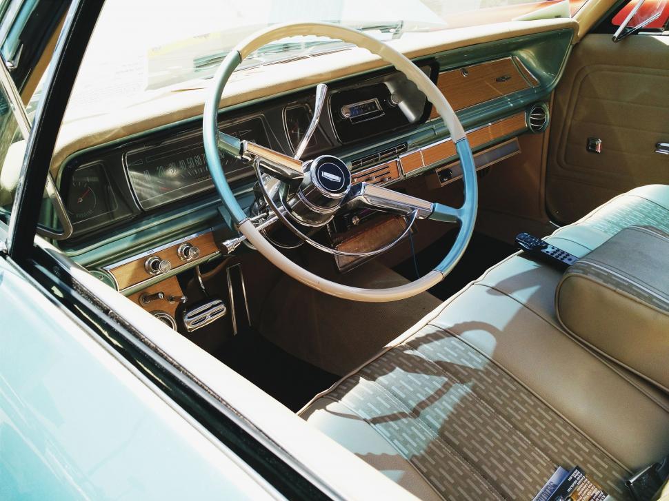 Free Image of The Interior of a Car With Steering Wheel and Dashboard 