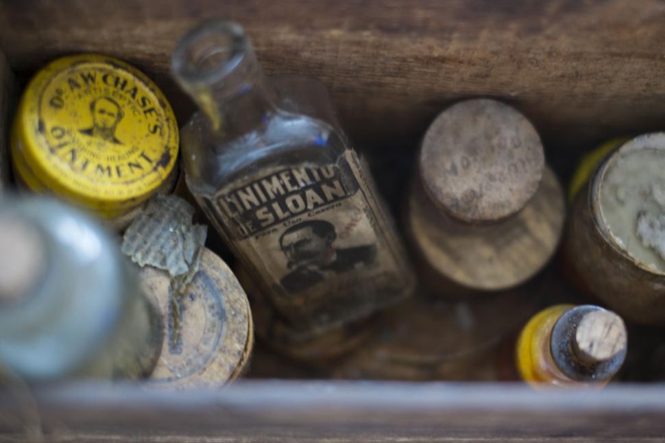 Free Image of Wooden Box Filled With Bottles 