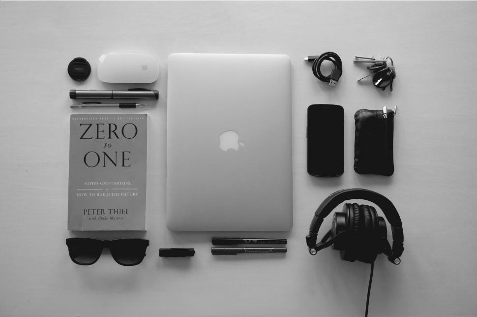 Free Image of White Table With Headphones and Laptop 
