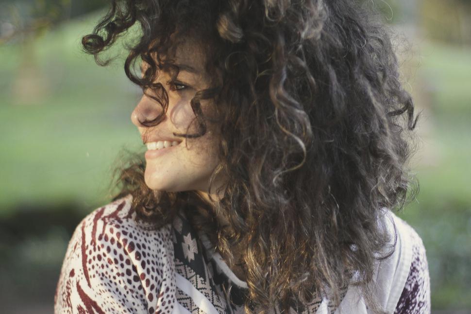 Free Image of Close Up of a Person With Curly Hair 