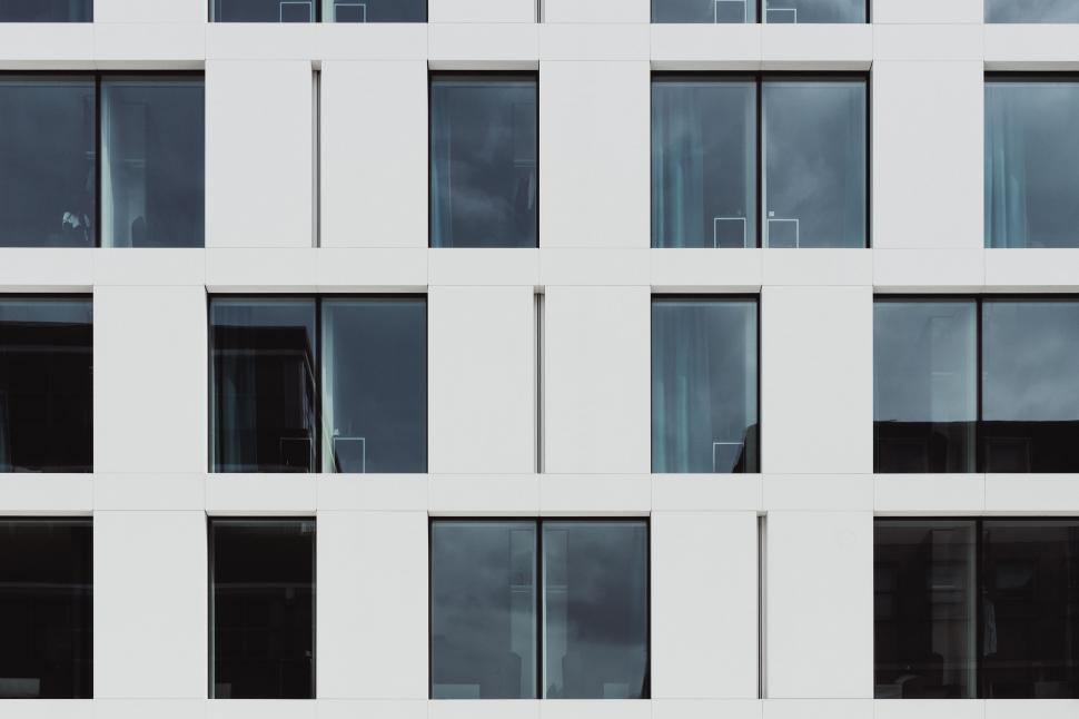 Free Image of Modern White Building With Numerous Windows 