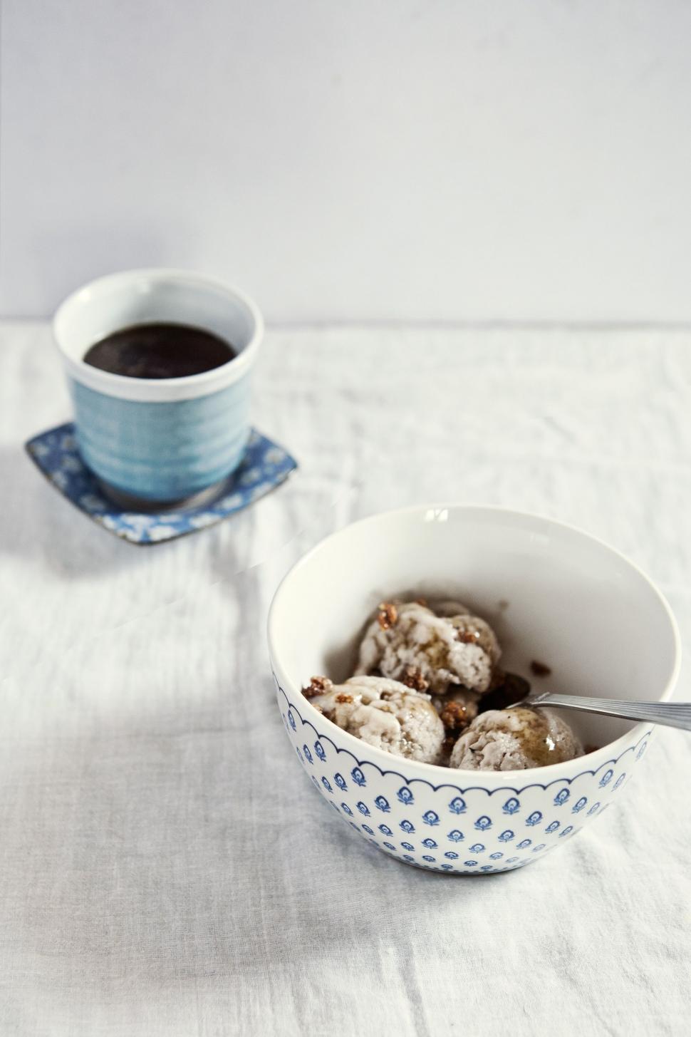 Free Image of A Bowl of Cookies and a Cup of Coffee 