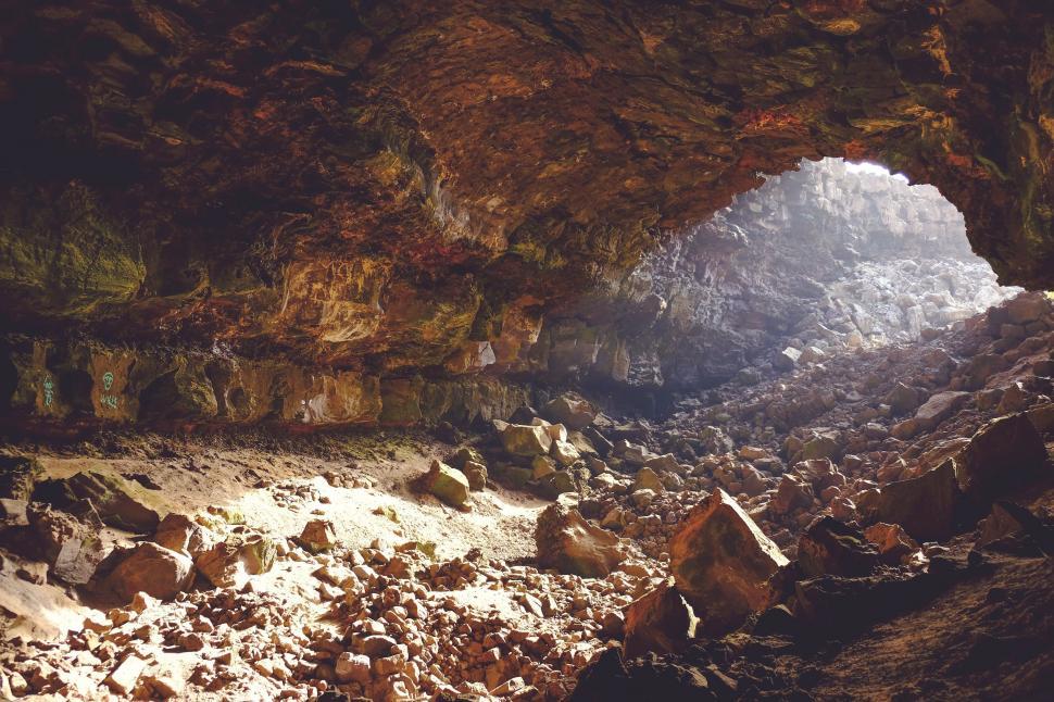 Free Image of Rocky Cave Filled With Debris 