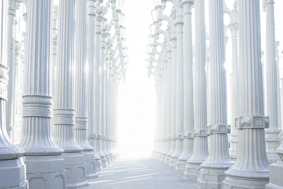 Free Image of Row of White Pillars in a Line 