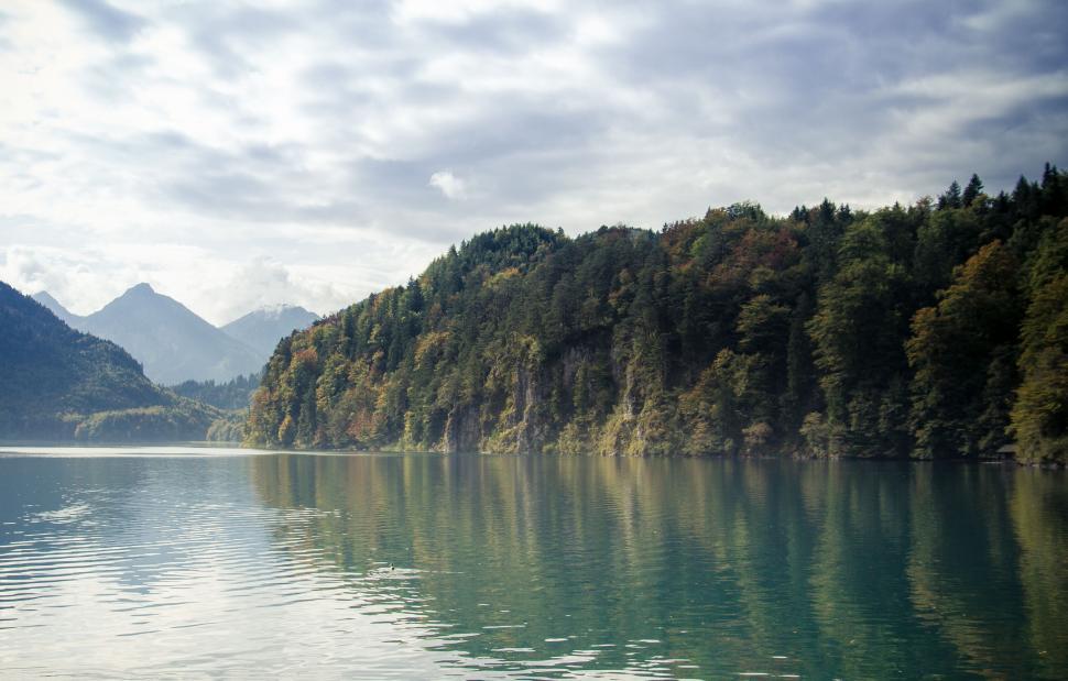 Free Image of Pristine Lake Surrounded by Forest and Mountains 