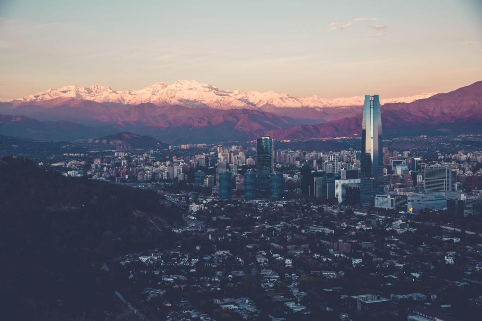 Free Image of City Skyline With Majestic Mountains 