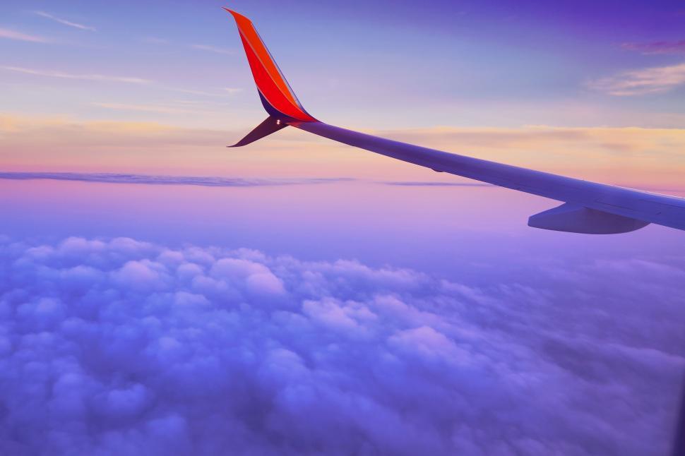 Free Image of Wing of an Airplane in Flight 
