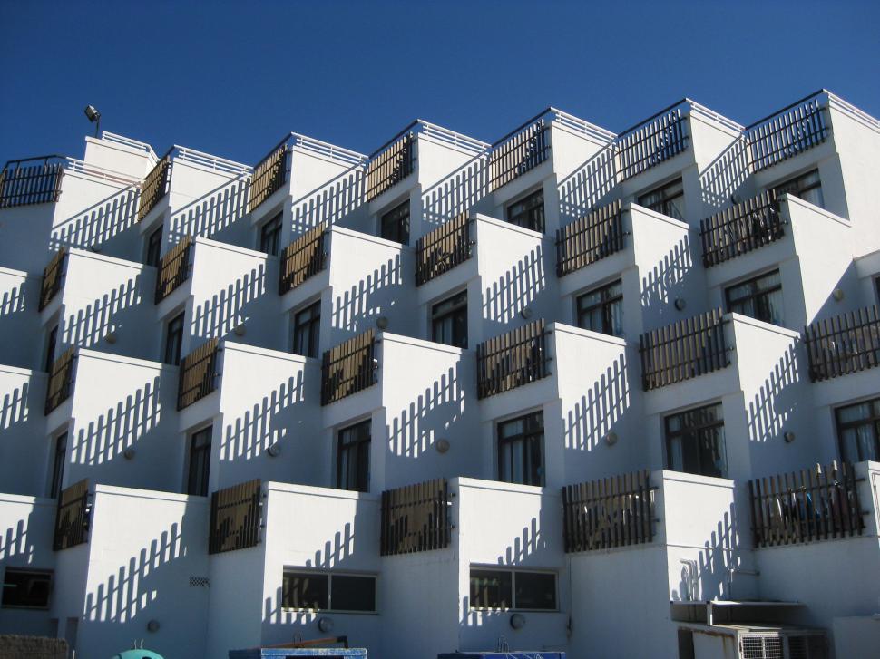 Free Image of Tall White Building With Balconies 