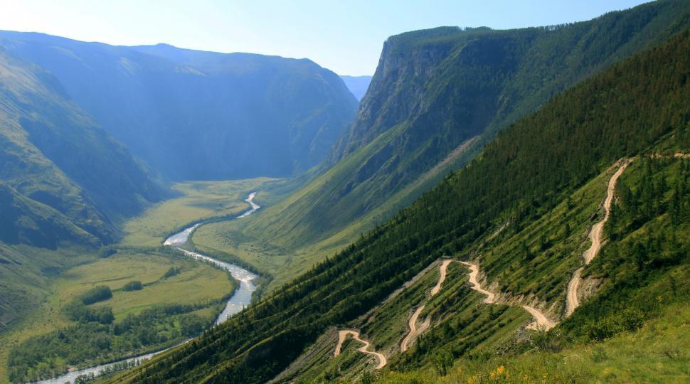 Free Image of Majestic Valley With River Flowing Through 