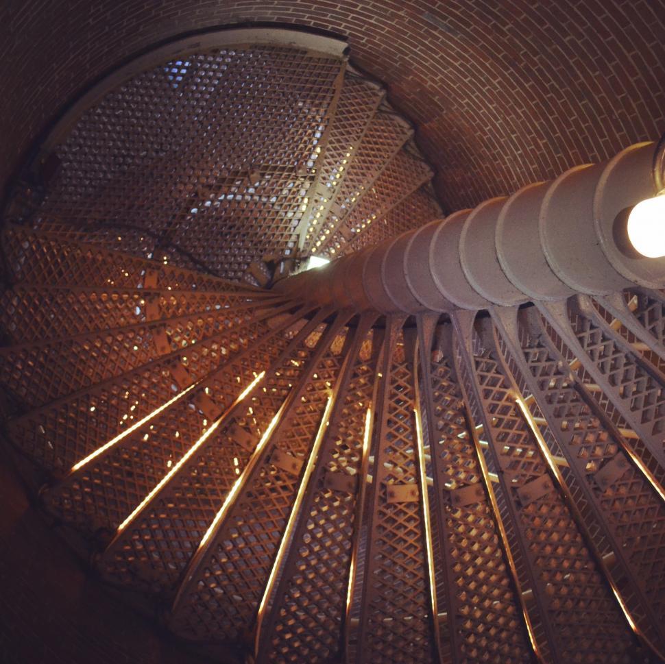 Free Image of Illuminated Spiral Staircase Detail 