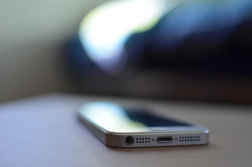 Free Image of Close Up of a Cell Phone on a Table 