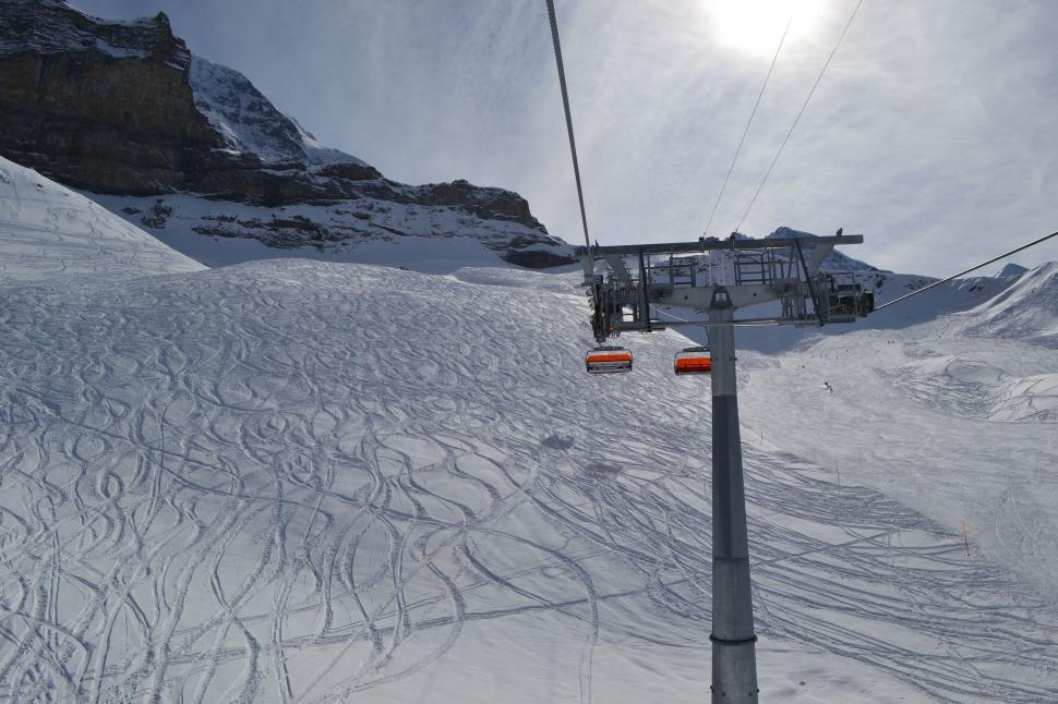 Free Image of Ski Lift Ascending Snowy Mountain 