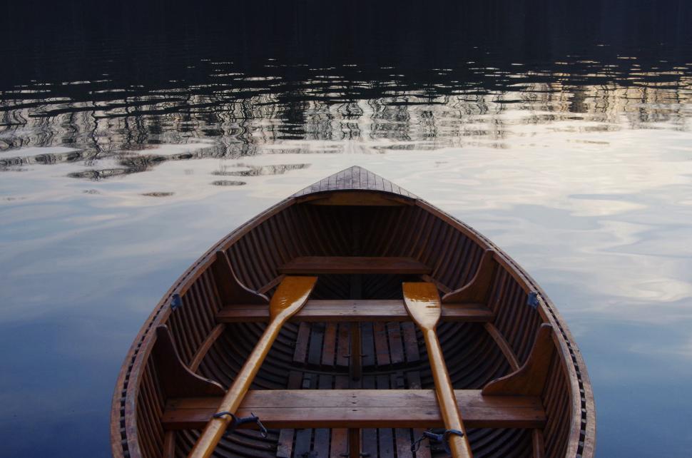 Free Image of Row Boat Floating on a Lake 