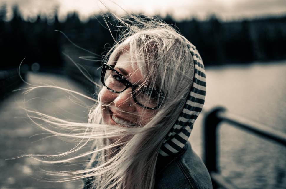 Free Image of Woman With Long Hair and Glasses Smiling 