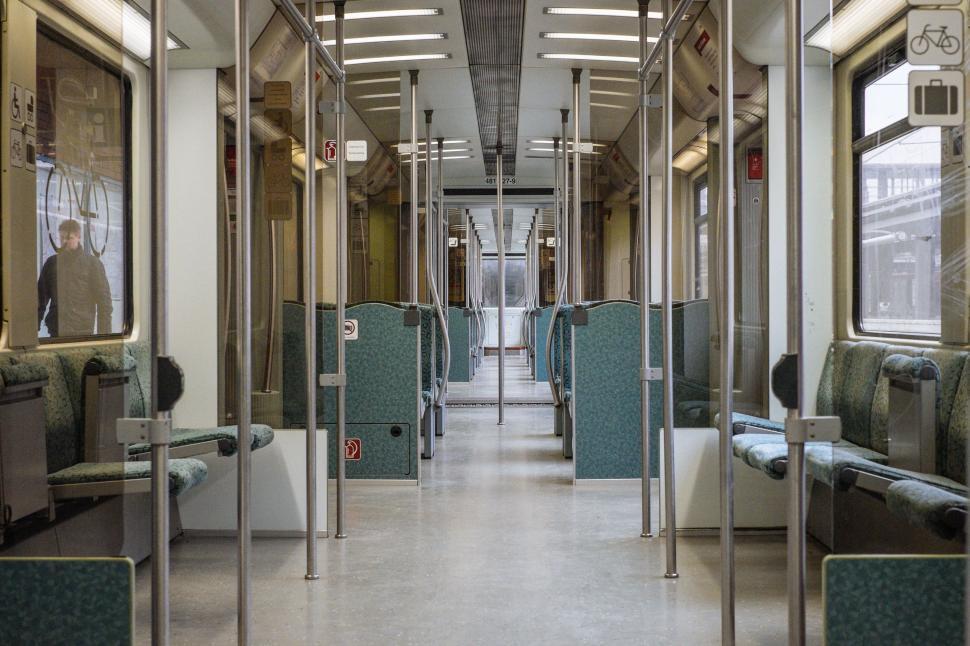 Free Image of Train Car Filled With Empty Seats 