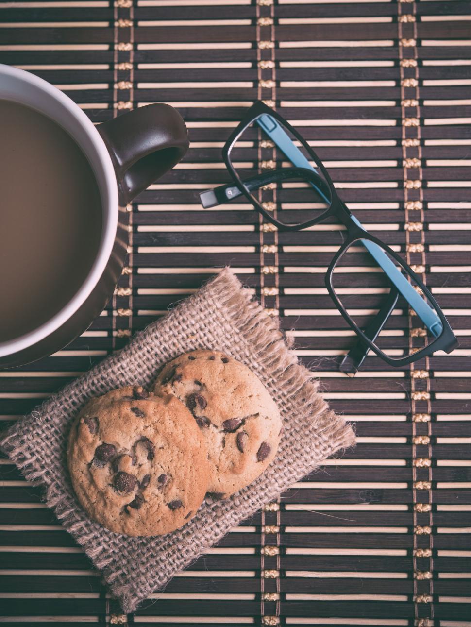 Free Image of Cookie and Coffee on Table 