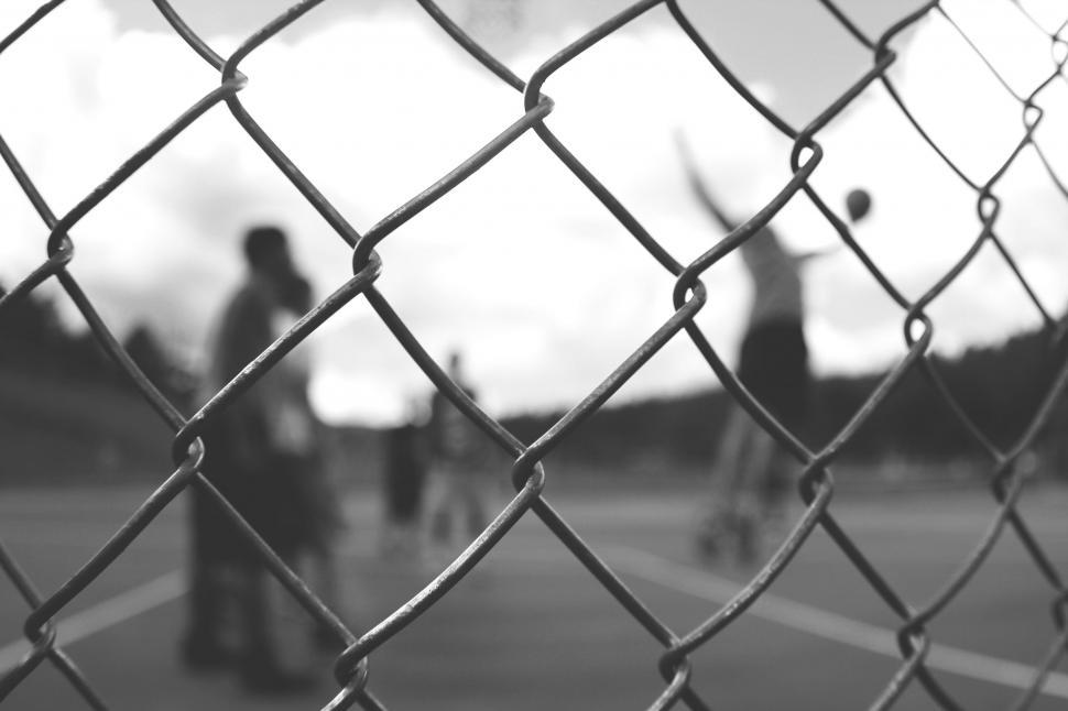 Free Image of People Playing Tennis on Court 
