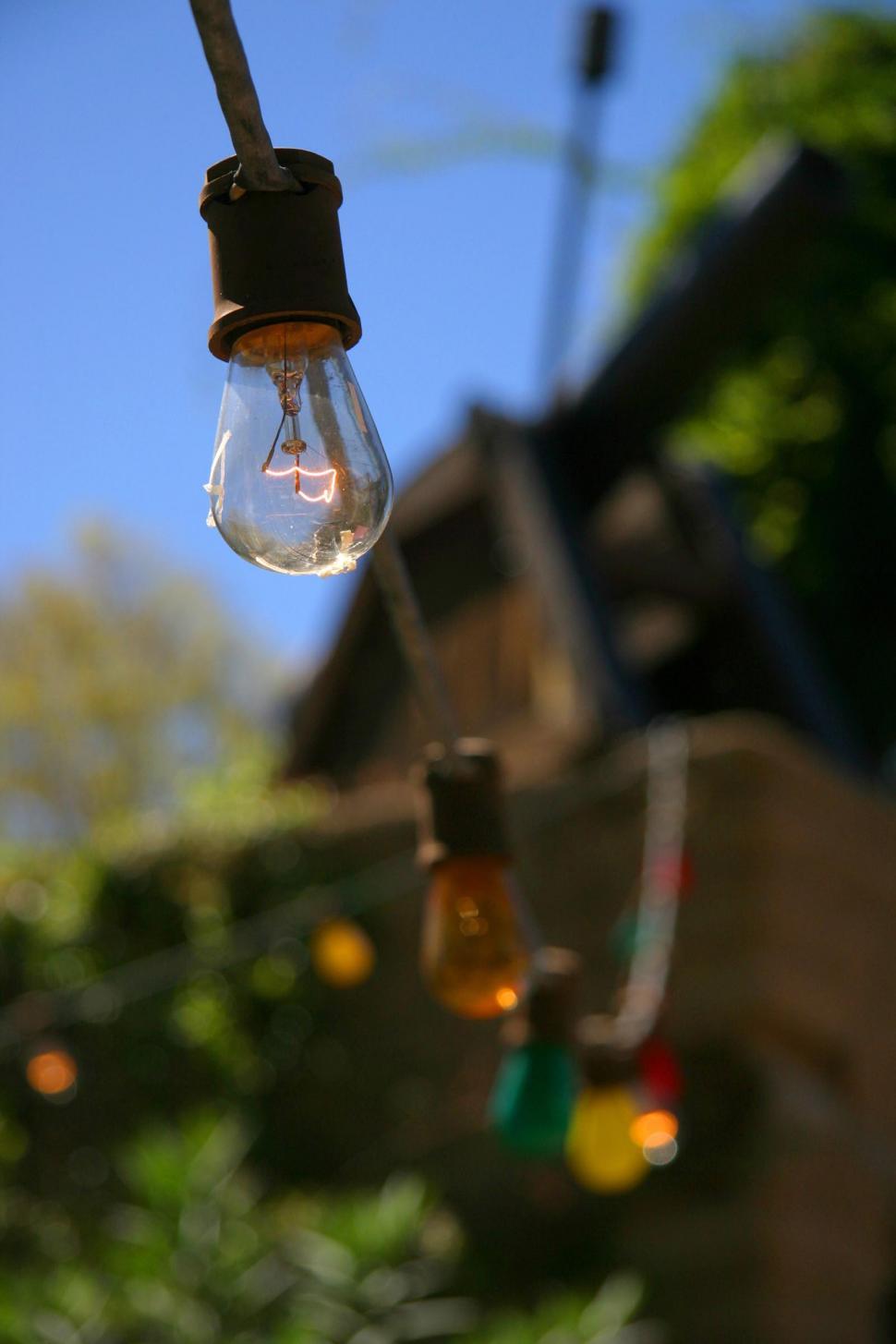 Free Image of String of Lights Hanging From Roof 