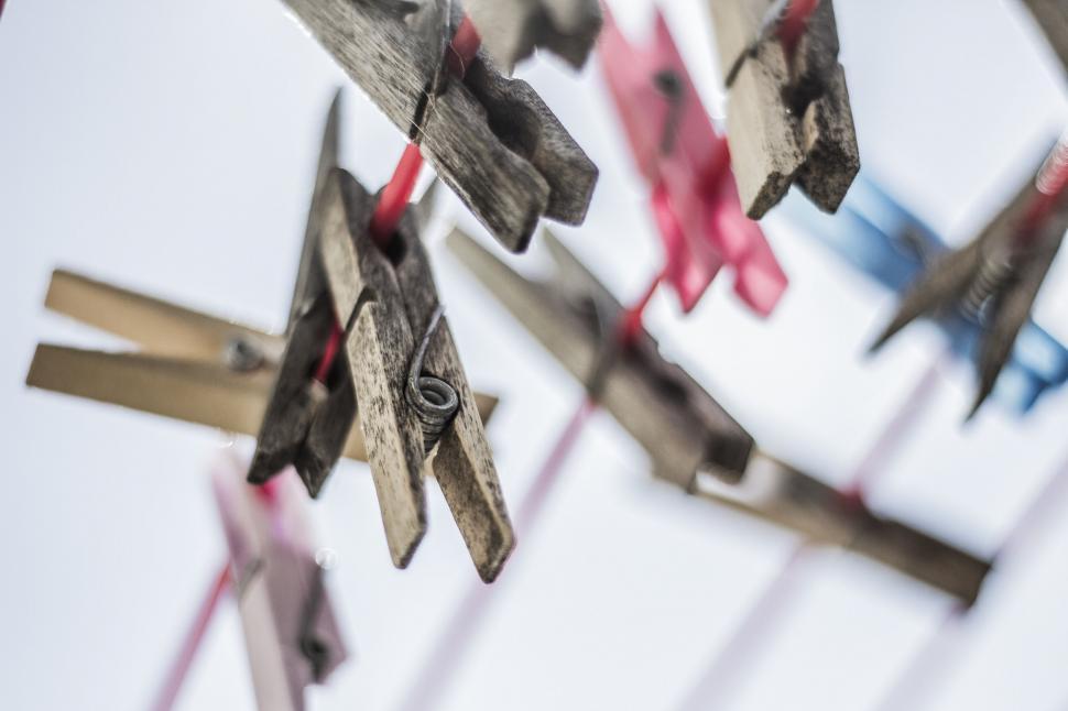 Free Image of Wooden Crosses Hanging on Line 