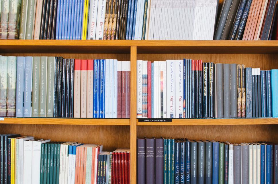 Free Image of Organized Book Shelf Filled With Numerous Books 