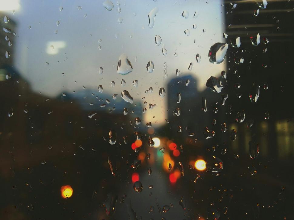 Free Image of Street View Through Rain-Covered Window 