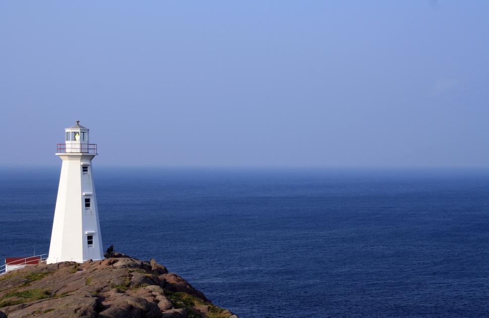 Free Image of White Lighthouse on Cliff 