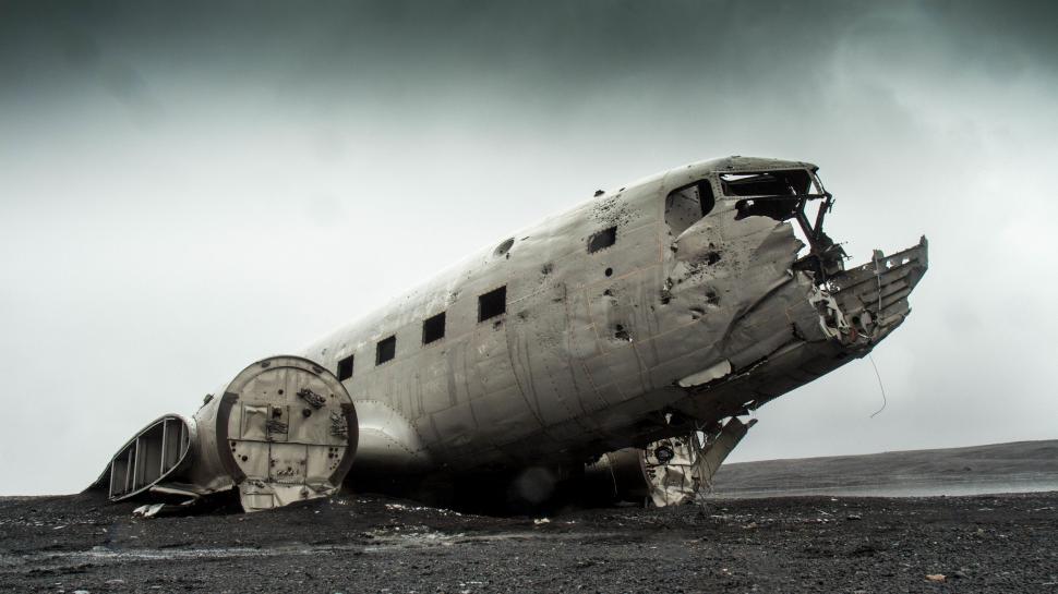 Free Image of Old Airplane on Dirt Field 