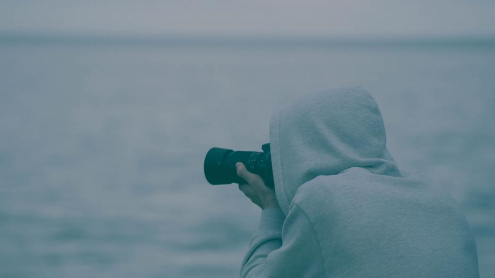 Free Image of Person Capturing Picture of Water Body 