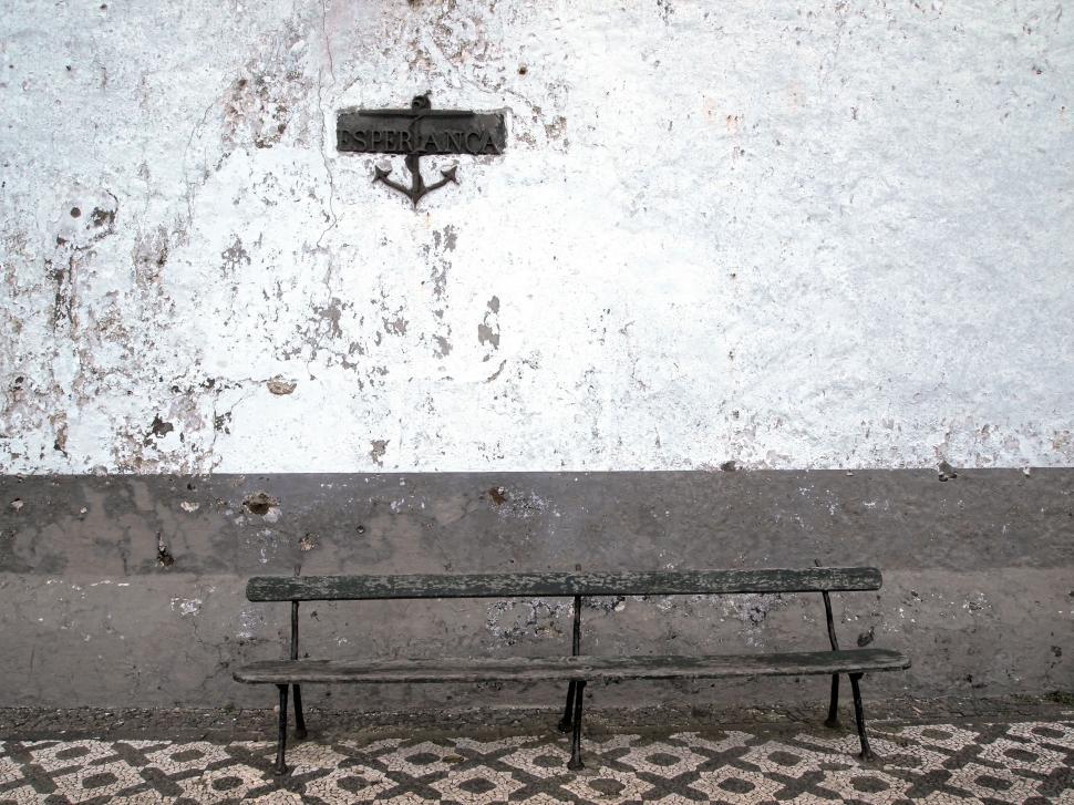 Free Image of A Bench in Front of a White Wall 