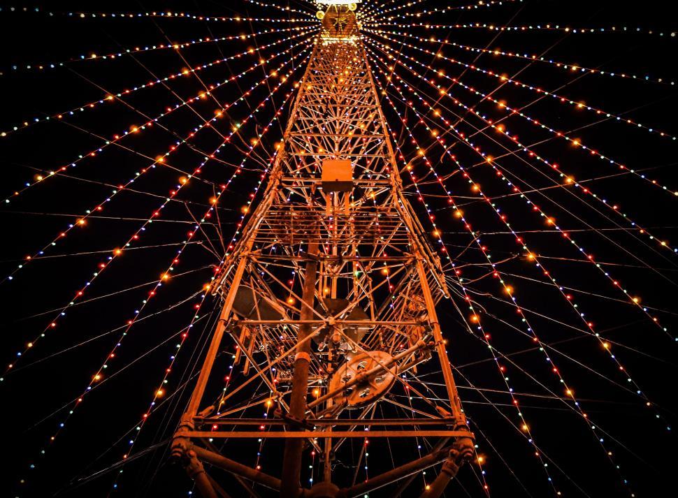 Free Image of Tower Illuminated With Bright Lights 