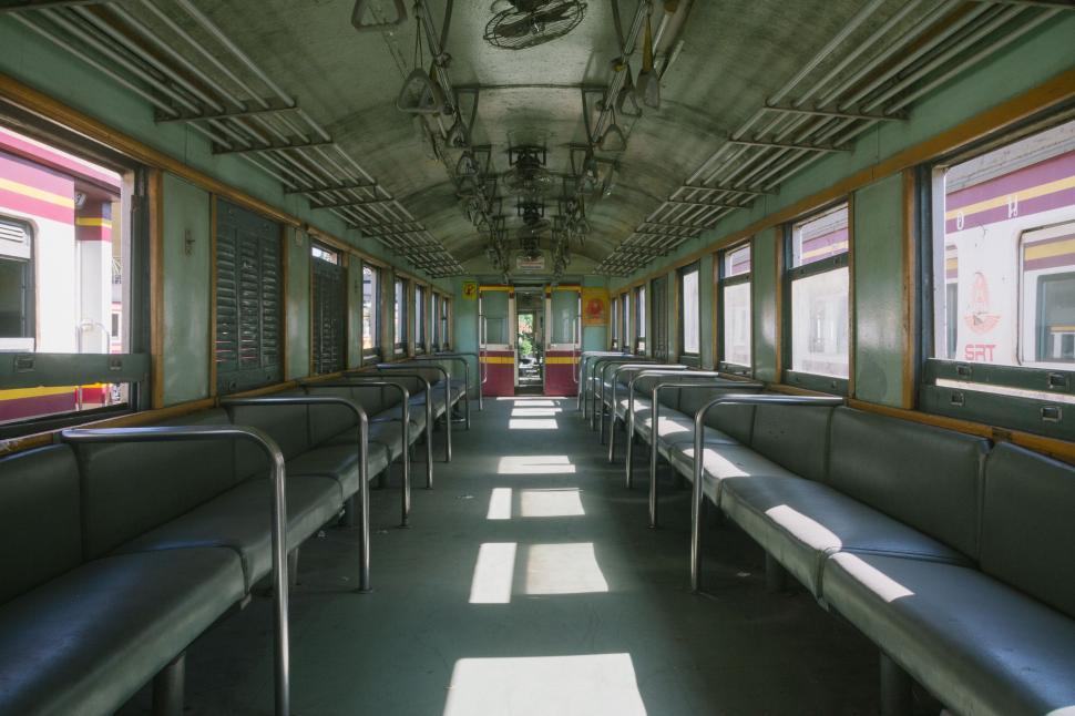 Free Image of Inside of a Train Car With Lots of Windows 